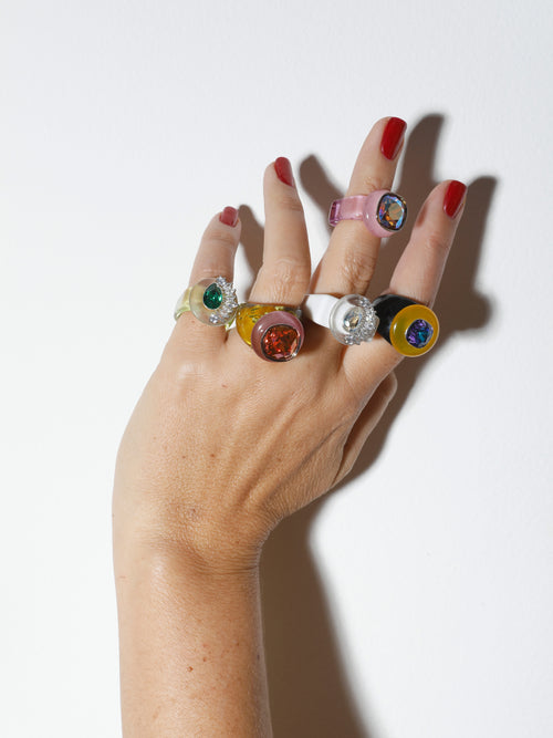 Studio shot of model wearing MOUNSER Ring Pop in Shaved Ice colorful sculptural cocktail ring