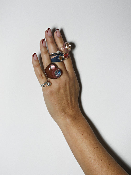 On hand shot of MOUNSER Ring Pop in Sheer Nylons colorful sculptural cocktail ring