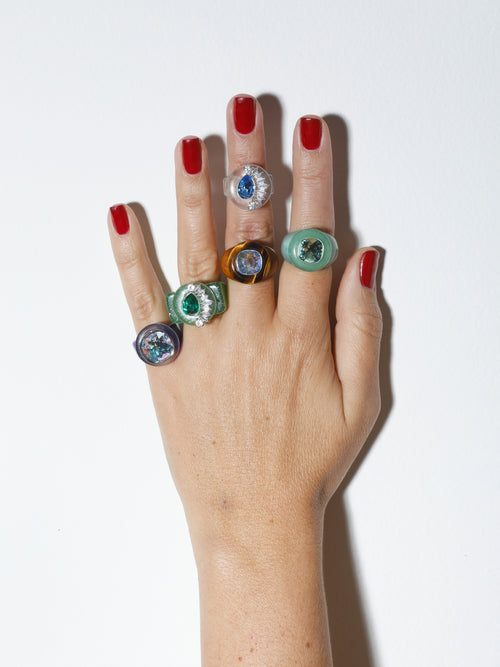 On hand studio shot of MOUNSER Ring Pop in Tanzanite purple sculptural cocktail ring