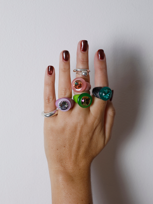 MOUNSER Ring Pop in Mesclun worn with ring stacks, styling a colorful resin statement ring.