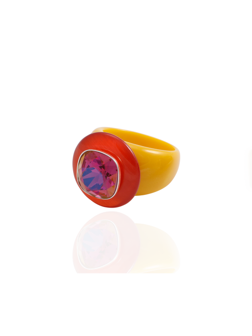Side profile of the MOUNSER Ring Pop in Red Lantana showing its sculptural shape and opaque red and yellow acrylic resin band.