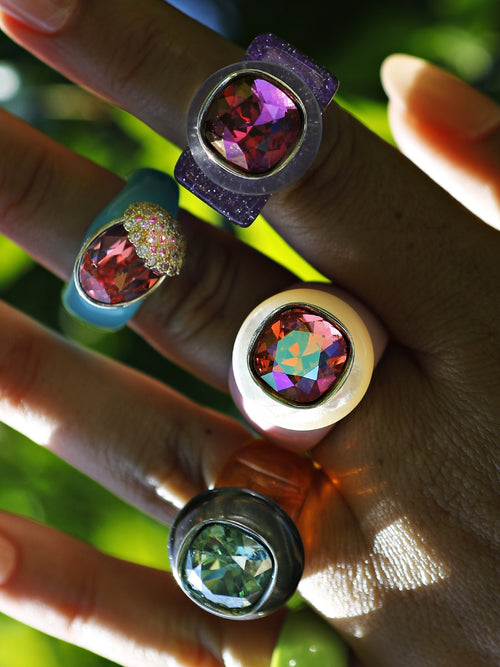 Close-up of MOUNSER Ring Pop in Uni with acrylic resin band and Austrian crystal stone