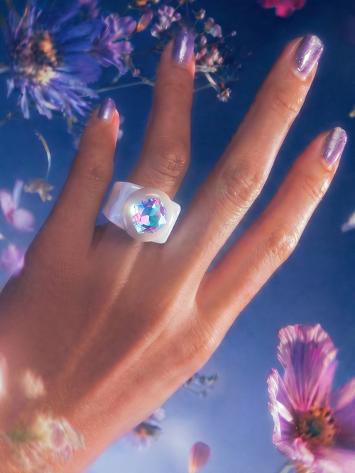 MOUNSER Spectrum Ring in Bleach worn on model's hand — milky white limited edition cocktail ring with iridescent Austrian crystal, art object jewelry handcrafted to order in Los Angeles.