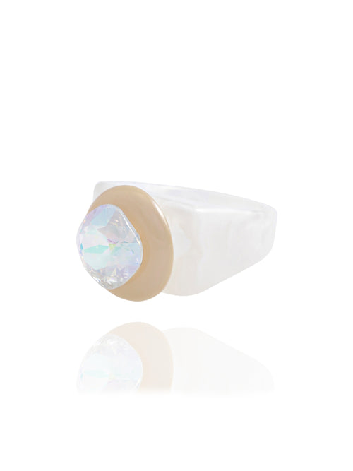 MOUNSER Spectrum Ring in Bleach — side profile view of white acrylic resin sculptural statement ring with iridescent crystal set in diamond position, handcrafted in Los Angeles.