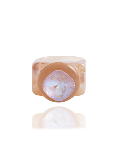 MOUNSER Spectrum Ring in Foundation — milky beige hand-polished acrylic resin cocktail ring with iridescent cushion-cut Austrian crystal center stone, forward facing view.