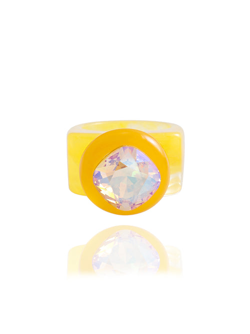 MOUNSER Spectrum Ring in Giorgio — milky yellow hand-polished acrylic resin cocktail ring with iridescent cushion-cut Austrian crystal center stone, forward facing view.
