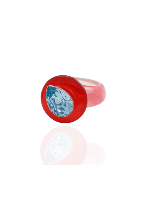 Side profile of the MOUNSER Tears of Joy Ring in Wedgewood showing the asymmetric setting and color-splashed resin band.