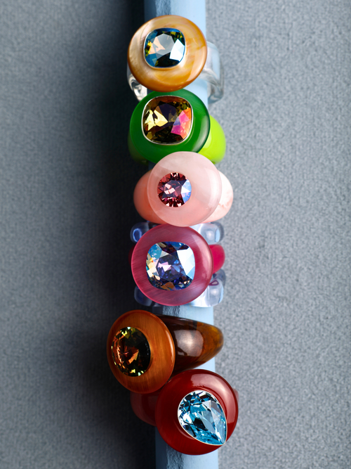 MOUNSER Tears of Joy Ring in Wedgewod worn with colorful acrylic rings stacked, styling bold resin statement rings.