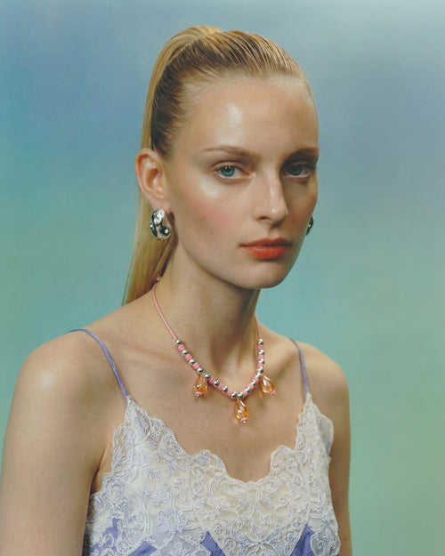 pink cord choker necklace with glass beads. y2k jewelry aesthetic.