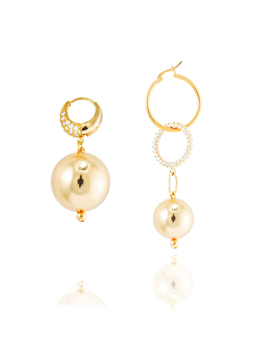 MOUNSER Full Moon Continuum Hoops in Gold Sculptural mismatched hoop earring pair with ball drops.