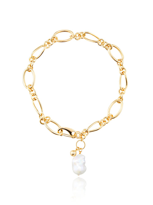 MOUNSER Waxing Necklace in Gold a luminous 14k gold plated brass chain with a baroque freshwater pearl pendant